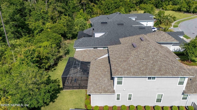 bird's eye view with a view of trees