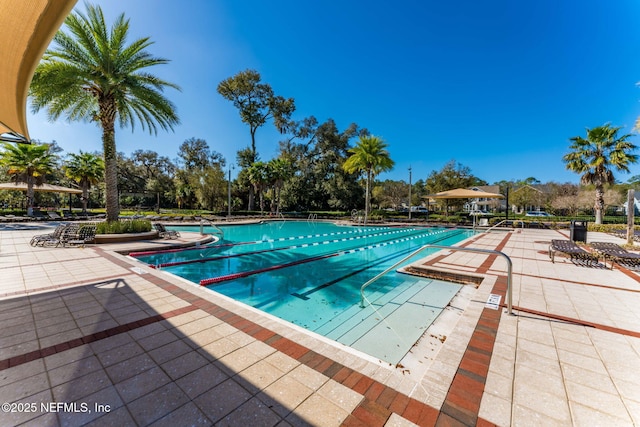 community pool with a patio