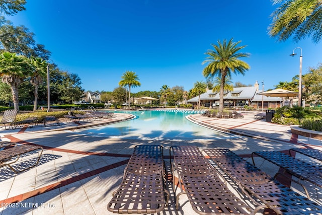 pool featuring a patio area