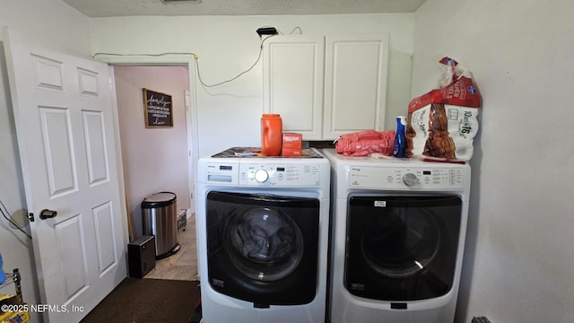 45116 Coquina Way, Callahan, FL 32011 - laundry room featuring cabinet space and washer and clothes dryer