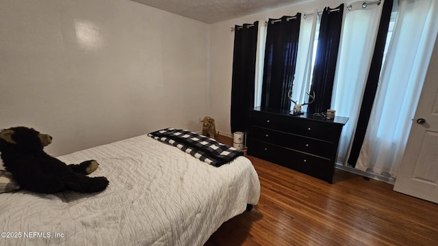45116 Coquina Way, Callahan, FL 32011 - bedroom featuring wood finished floors