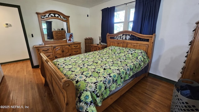 45116 Coquina Way, Callahan, FL 32011 - bedroom with wood finished floors and baseboards