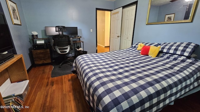 45116 Coquina Way, Callahan, FL 32011 - bedroom with wood finished floors, a desk, and a closet