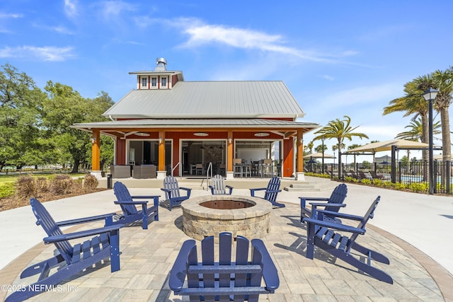 2793 Pointed Leaf Rd, Green Cove Springs, FL 32043 - view of patio / terrace featuring a fire pit, outdoor dry bar, and fence