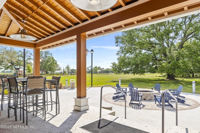 2793 Pointed Leaf Rd, Green Cove Springs, FL 32043 - view of patio / terrace featuring a fire pit and ceiling fan