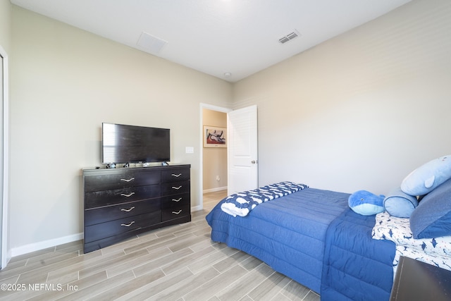 2793 Pointed Leaf Rd, Green Cove Springs, FL 32043 - bedroom with light wood-type flooring, visible vents, and baseboards