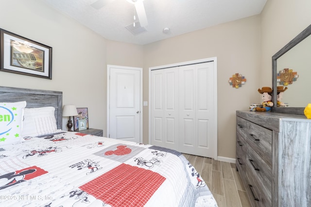 2793 Pointed Leaf Rd, Green Cove Springs, FL 32043 - bedroom featuring baseboards, a ceiling fan, wood tiled floor, and a closet
