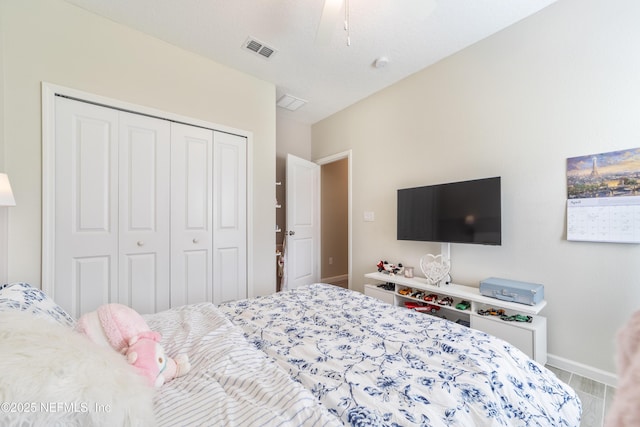 2793 Pointed Leaf Rd, Green Cove Springs, FL 32043 - bedroom with baseboards, visible vents, and a closet