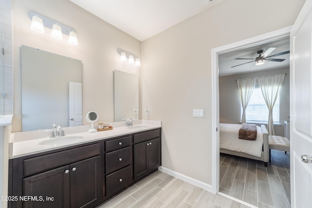 2793 Pointed Leaf Rd, Green Cove Springs, FL 32043 - full bathroom with ceiling fan, a sink, wood tiled floor, and double vanity