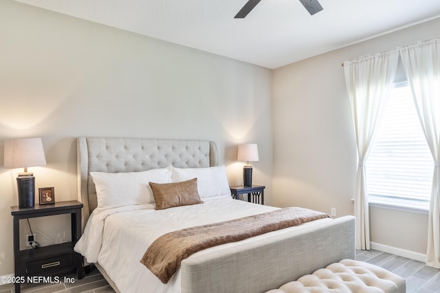 2793 Pointed Leaf Rd, Green Cove Springs, FL 32043 - bedroom with baseboards, a ceiling fan, multiple windows, and wood tiled floor