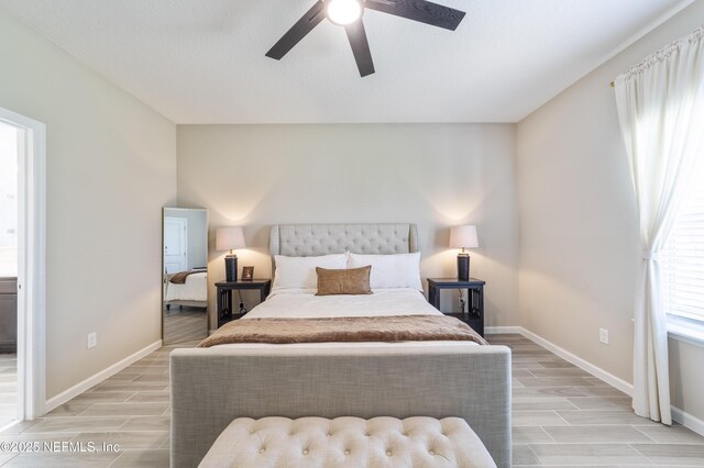 2793 Pointed Leaf Rd, Green Cove Springs, FL 32043 - bedroom with wood tiled floor, a ceiling fan, and baseboards