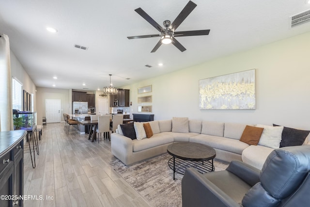 2793 Pointed Leaf Rd, Green Cove Springs, FL 32043 - living room featuring light wood-style floors, visible vents, and recessed lighting