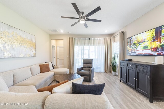 2793 Pointed Leaf Rd, Green Cove Springs, FL 32043 - living room with light wood-style flooring, visible vents, recessed lighting, and a ceiling fan