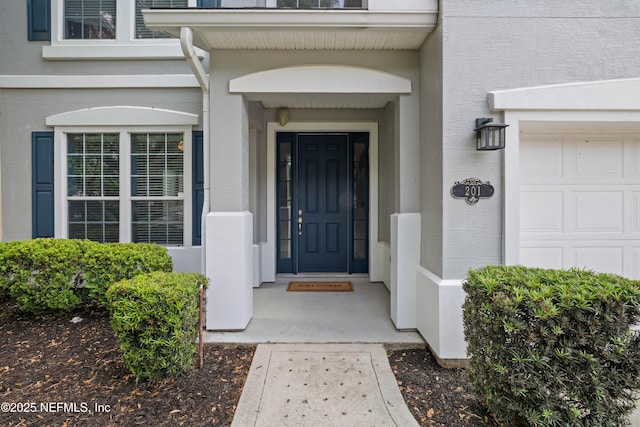property entrance featuring a garage