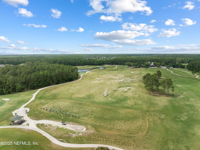 aerial view with a water view, golf course view, and a forest view