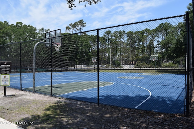 view of sport court with fence and community basketball court