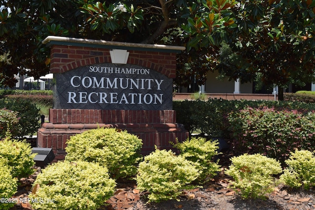 view of community sign