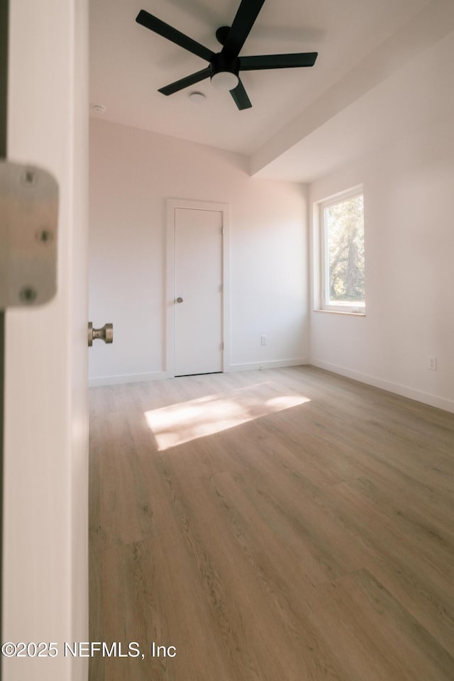572 Woodlawn Rd, Saint Augustine, FL 32084 - spare room featuring ceiling fan, baseboards, and light wood-style flooring