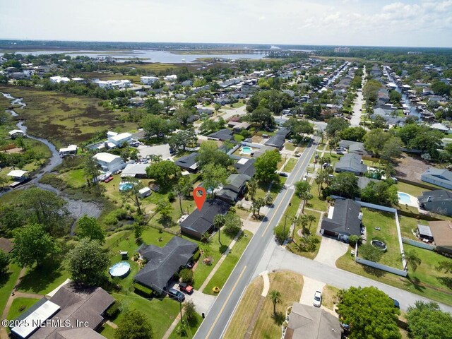aerial view with a residential view and a water view