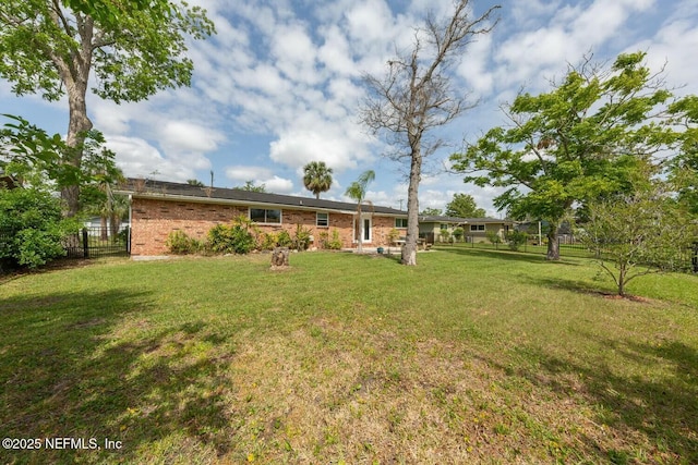 view of yard featuring fence