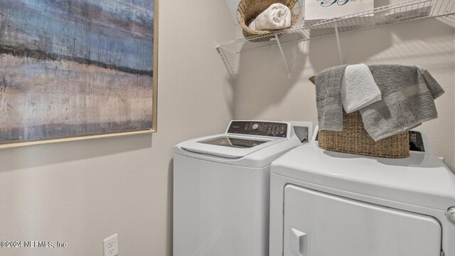 59 Craig Ct, Saint Johns, FL 32092 - laundry area featuring washing machine and dryer and laundry area