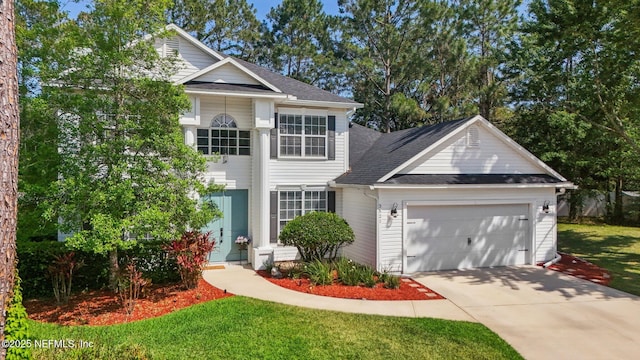 view of front of property featuring a garage, a front lawn, driveway, and a shingled roof