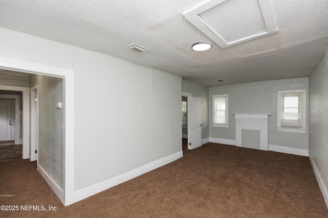 1488 W 5th St, Jacksonville, FL 32209 - carpeted spare room featuring baseboards, a textured ceiling, and visible vents