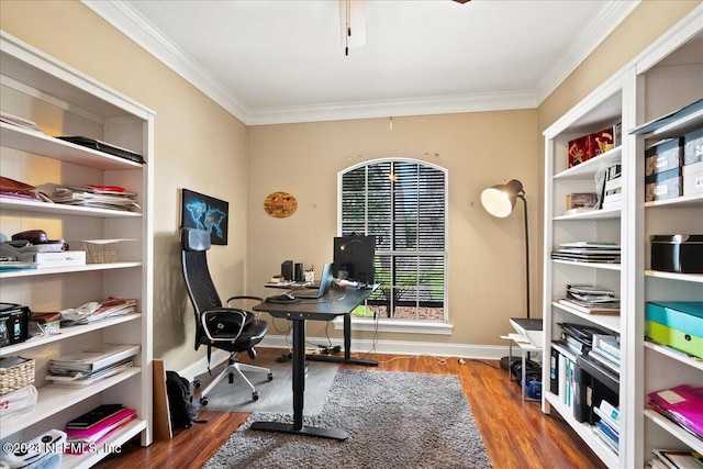 office area featuring baseboards, crown molding, and wood finished floors