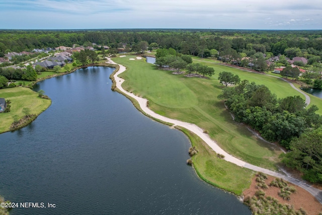aerial view with view of golf course, a water view, and a residential view