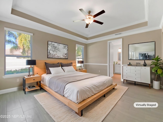 350 Latrobe Ave, Saint Augustine, FL 32095 - bedroom featuring visible vents, a tray ceiling, and multiple windows