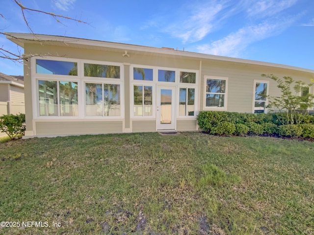 350 Latrobe Ave, Saint Augustine, FL 32095 - rear view of property featuring a yard