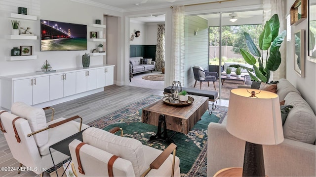 335 Dogleg Run, Saint Johns, FL 32259 - living area featuring wood finished floors, ceiling fan, and crown molding