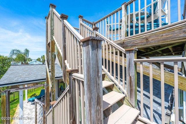 deck featuring stairway