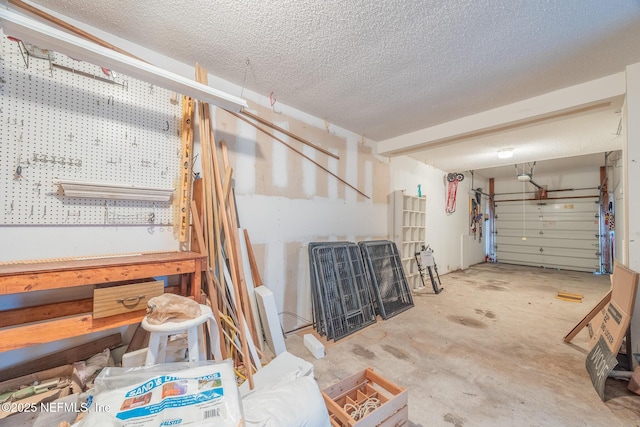 garage with a workshop area