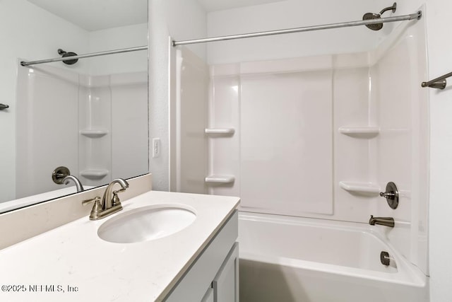 full bathroom featuring vanity and  shower combination