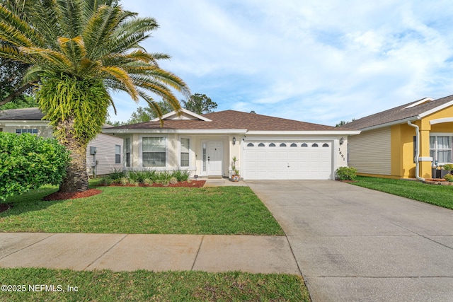 ranch-style house with a garage, driveway, a front yard, and stucco siding