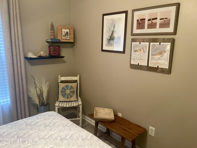 bedroom featuring baseboards