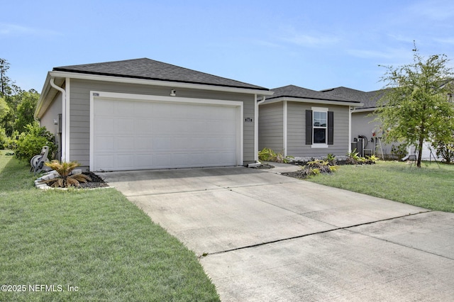 single story home with a shingled roof, a front lawn, driveway, and an attached garage