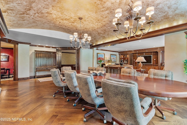 dining space featuring a chandelier, baseboards, lofted ceiling, and recessed lighting