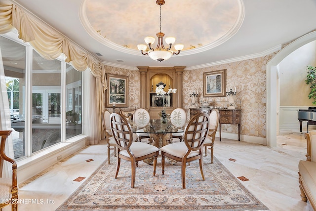 dining area with wallpapered walls, a chandelier, crown molding, arched walkways, and light marble finish floors