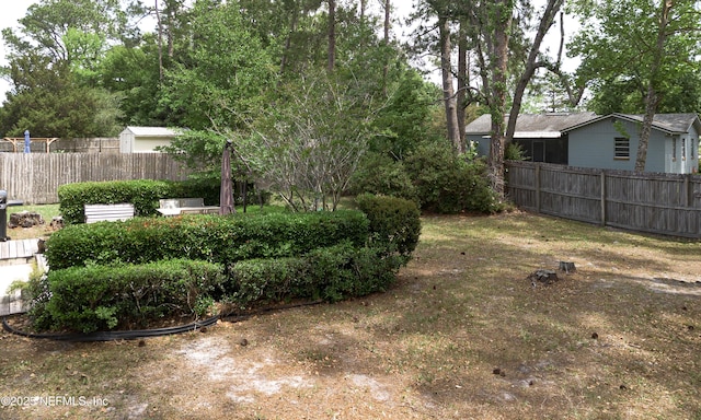 view of yard featuring fence