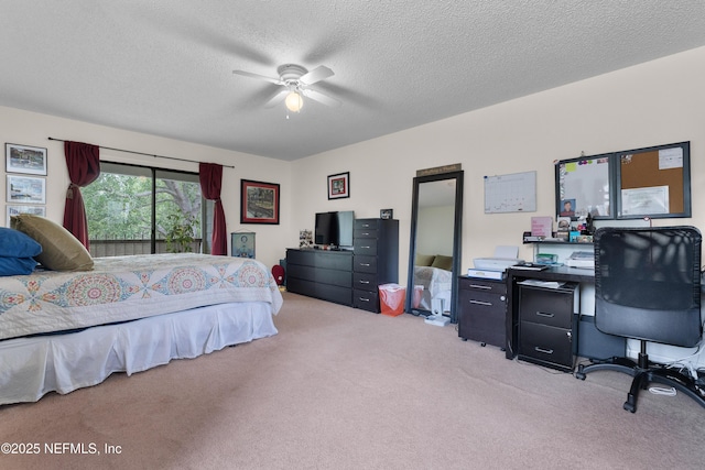 62 Atlantic Oaks Cir, Saint Augustine, FL 32080 - bedroom with light colored carpet, ceiling fan, and a textured ceiling