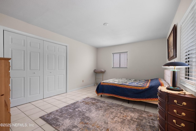 62 Atlantic Oaks Cir, Saint Augustine, FL 32080 - bedroom featuring light tile patterned flooring and a closet