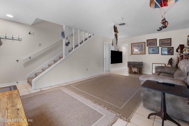 62 Atlantic Oaks Cir, Saint Augustine, FL 32080 - tiled living area with stairway, visible vents, and baseboards