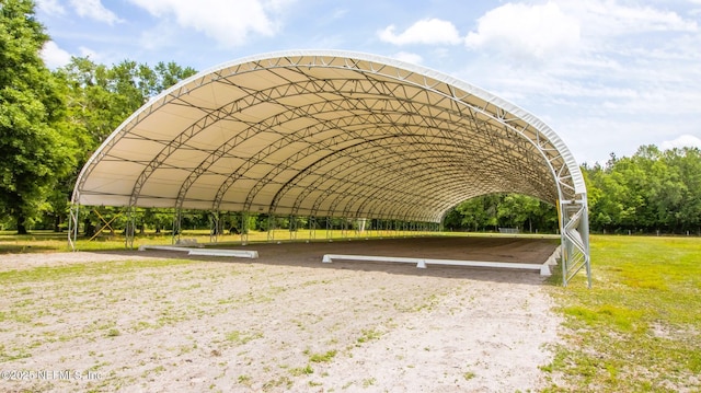 view of home's community featuring a covered structure