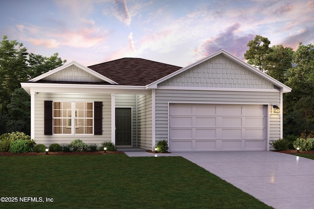 ranch-style house featuring an attached garage, a lawn, concrete driveway, and roof with shingles