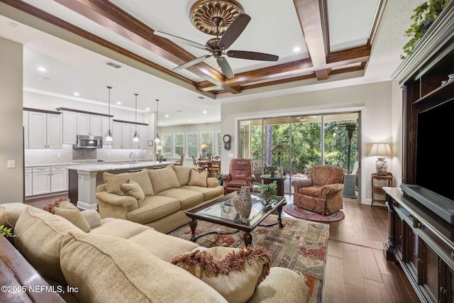 living area with a ceiling fan, visible vents, beam ceiling, recessed lighting, and dark wood-type flooring