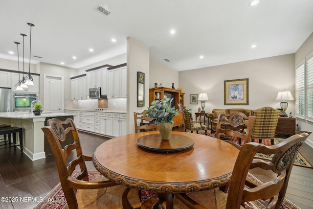 dining area with recessed lighting, dark wood-style floors, and visible vents