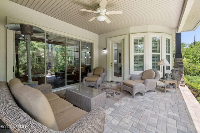 view of patio / terrace featuring a ceiling fan and outdoor lounge area