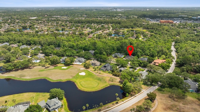 bird's eye view featuring a water view, a residential view, and golf course view